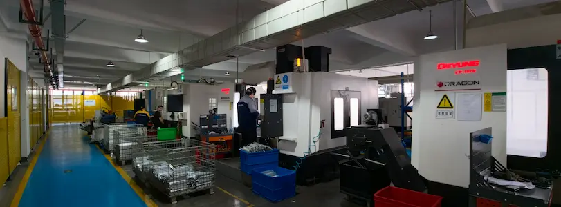 Large fabrication workshop — multi-bay production floor
